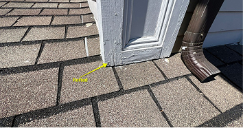 Rear dormer showing rot at casing base where trim meets roof surface — Chatham NJ